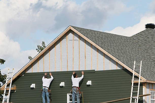 Professional Siding Contractor technician working in Spencerville, OH